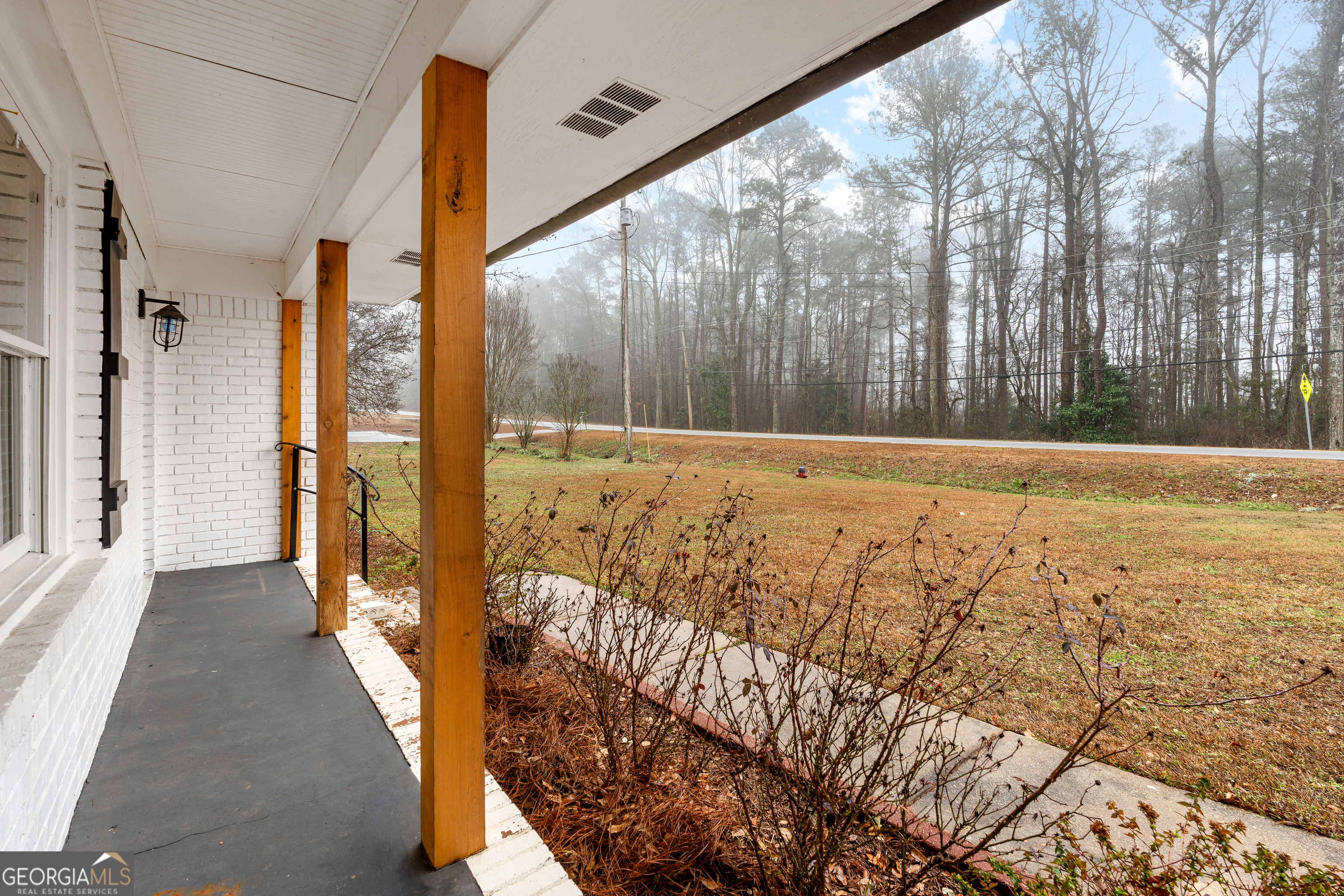 96 Poplar Road Newnan, GA 30263 - Photo 4 of 33 a view of an empty room