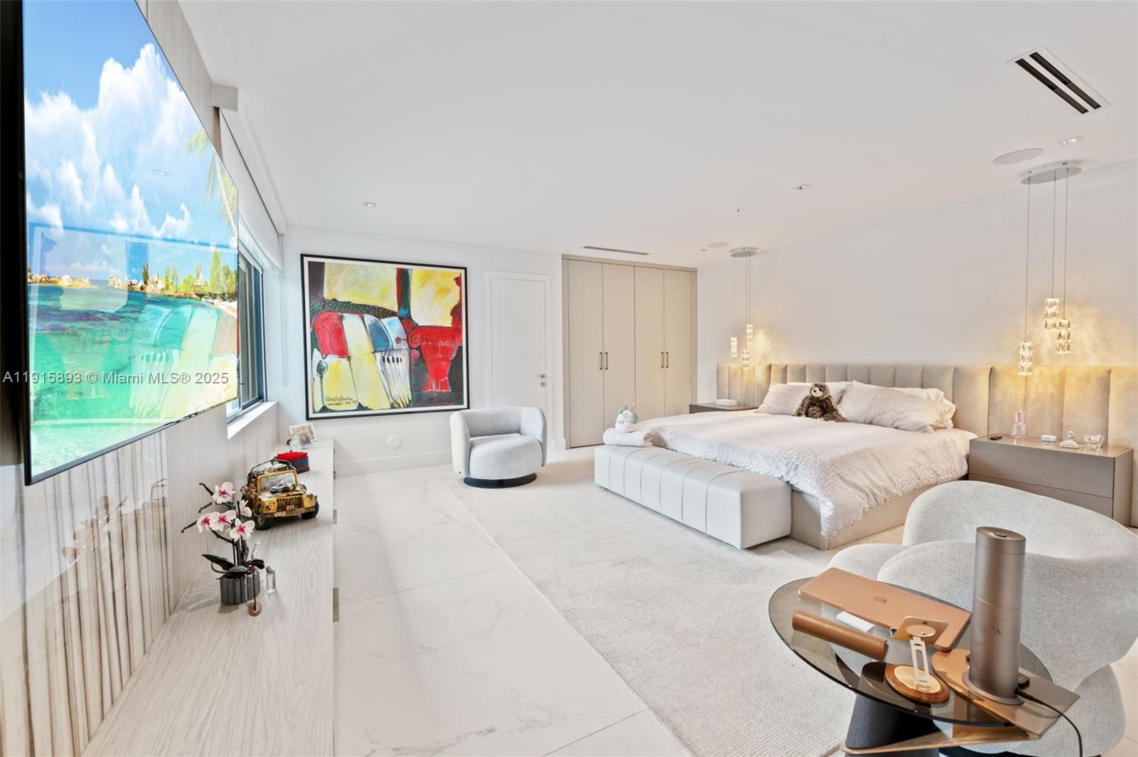 1792 Cleveland Road Miami Beach, FL 33141 - Photo 14 of 39 a bedroom with furniture and a window