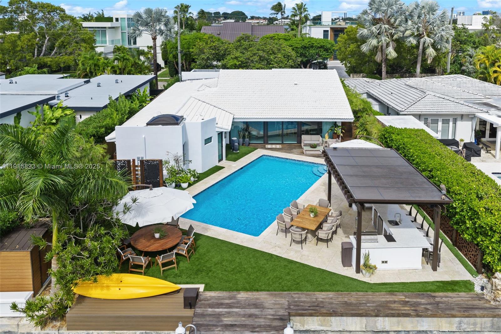 1792 Cleveland Road Miami Beach, FL 33141 - Photo 36 of 39 an aerial view of a house with swimming pool garden and patio