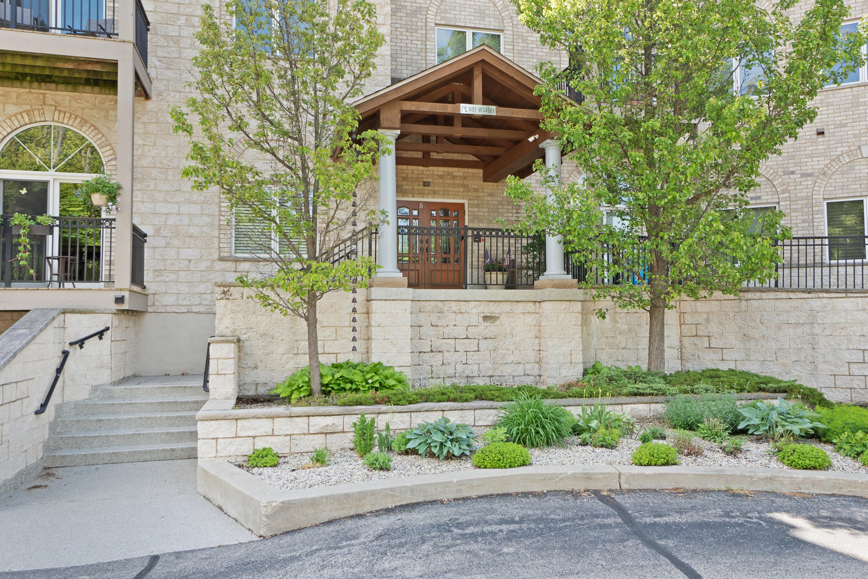 N51W34861 East Wisconsin Avenue, Unit 1120 Oconomowoc, WI 53069 - Photo 2 of 33 Entrance