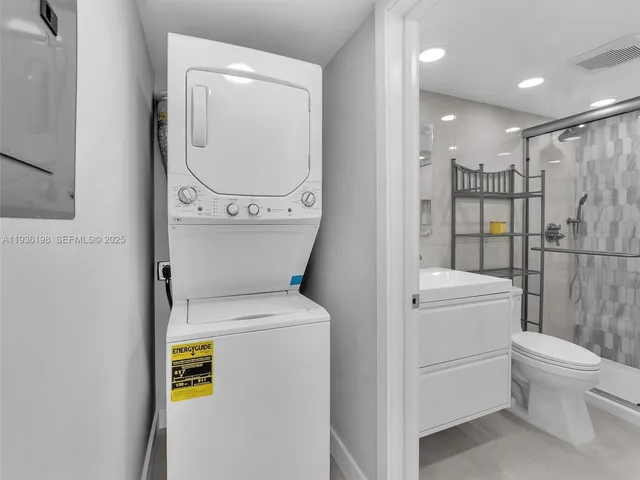 a view of a bathroom with a toilet and a sink