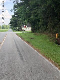 3312-17420 Watha Road Watha, NC 28478 - Photo 2 of 6 Road frontage is public and paved