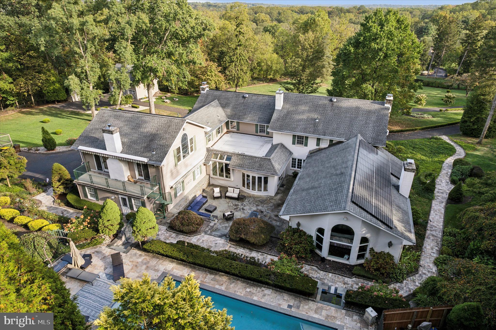 1087 Mt Eyre Road Washington Crossing, PA 18977 - Photo 12 of 77 an aerial view of a house with a garden