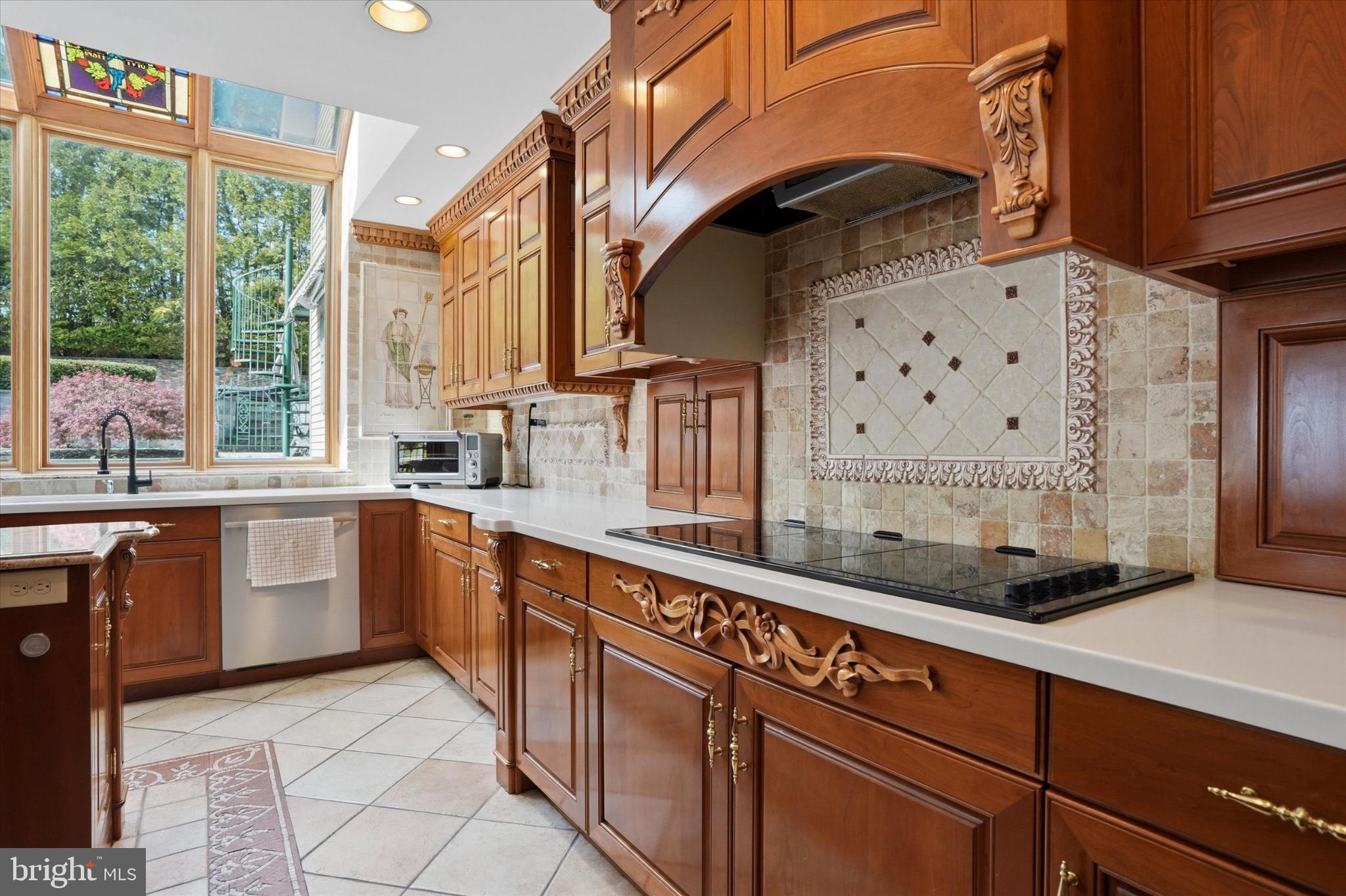 1087 Mt Eyre Road Washington Crossing, PA 18977 - Photo 44 of 77 Elegant kitchen with rich wood tones.