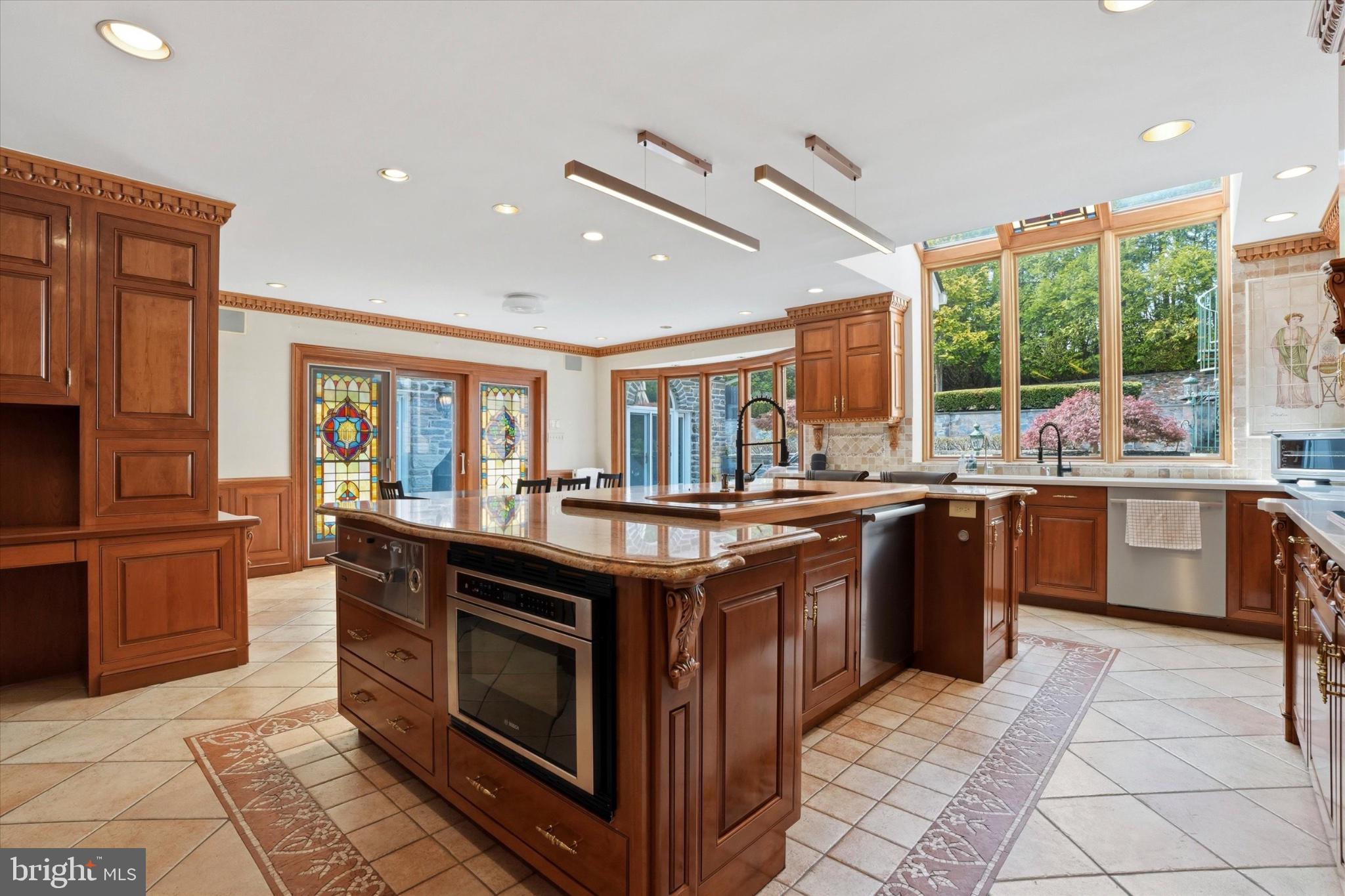 1087 Mt Eyre Road Washington Crossing, PA 18977 - Photo 47 of 77 Elegant kitchen with rich wood accents.