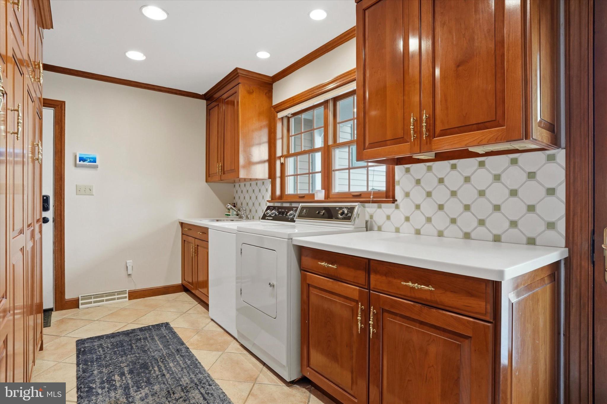 1087 Mt Eyre Road Washington Crossing, PA 18977 - Photo 52 of 77 Charming laundry space with modern flair.