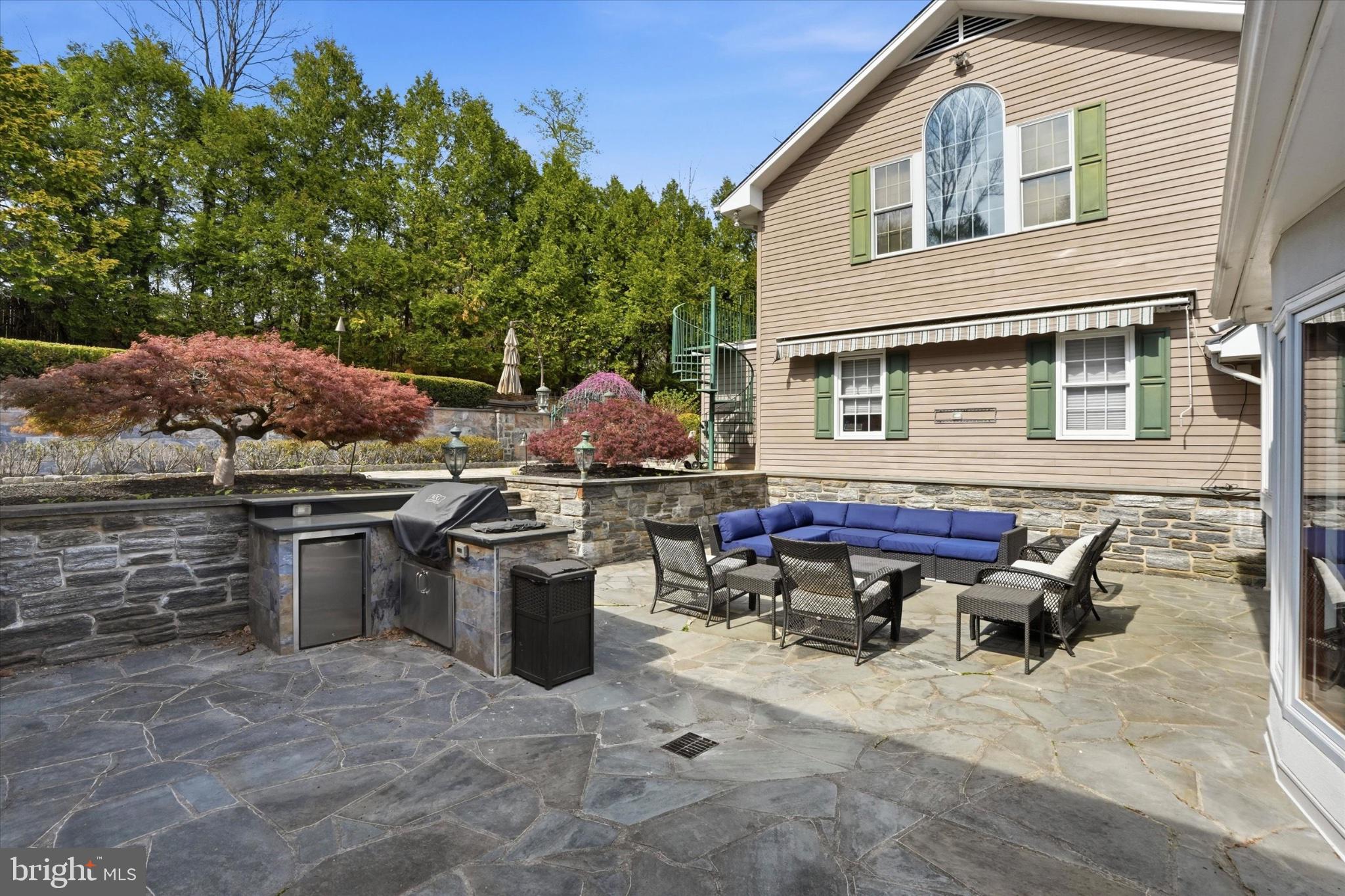 1087 Mt Eyre Road Washington Crossing, PA 18977 - Photo 66 of 77 Serene outdoor retreat with stone patio.
