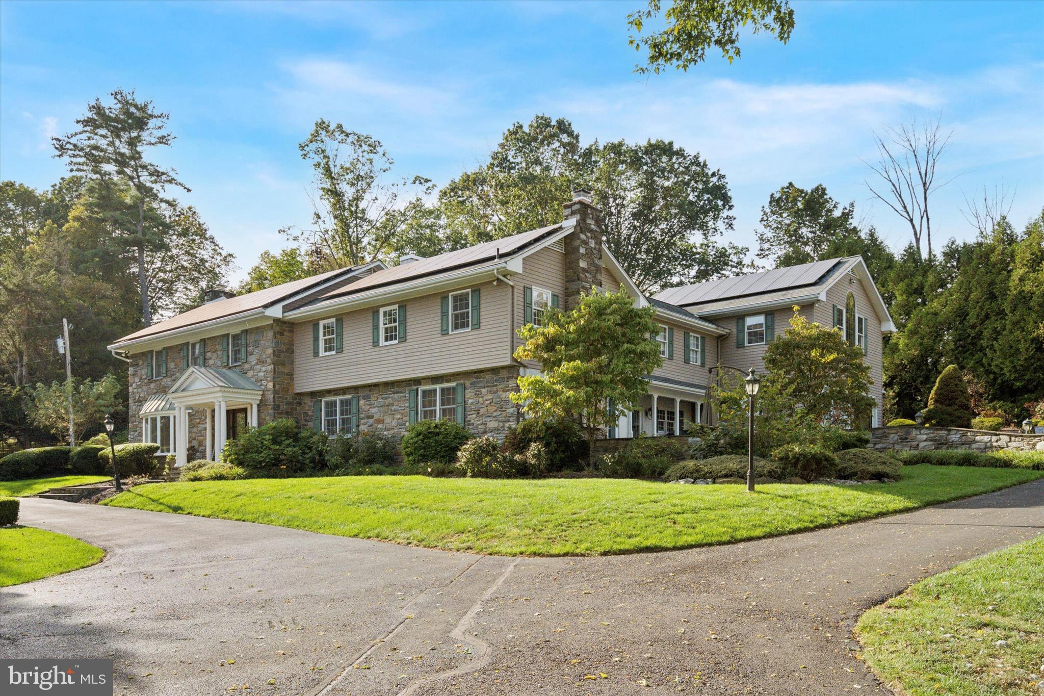 1087 Mt Eyre Road Washington Crossing, PA 18977 - Photo 9 of 77 a front view of a house with a yard