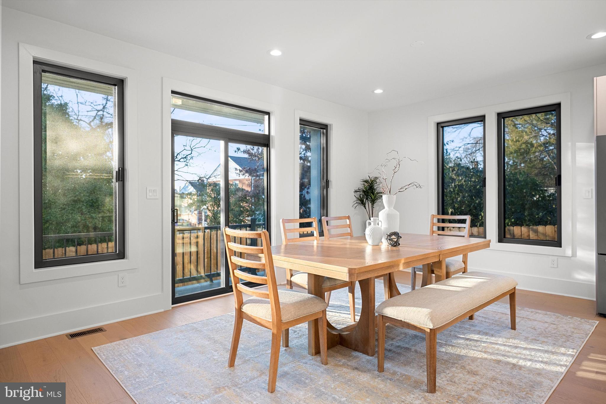 2100 South Nelson Street Arlington, VA 22204 - Photo 10 of 33 a living room with furniture a window and a potted plant