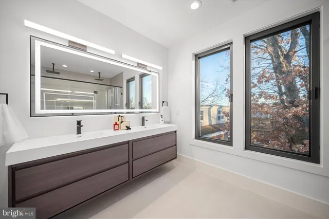 a bathroom with a shower and toilet
