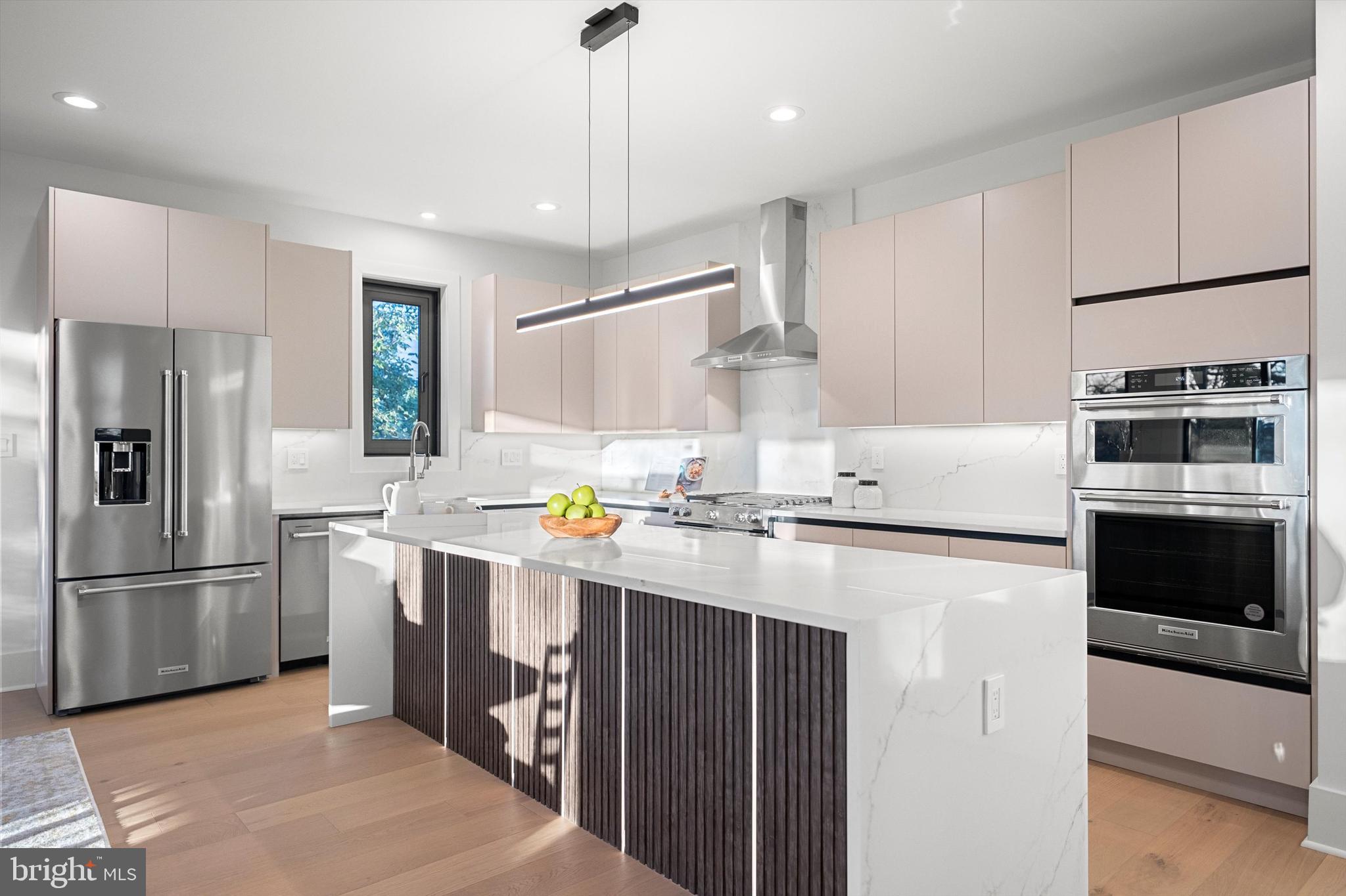 2100 South Nelson Street Arlington, VA 22204 - Photo 7 of 33 a kitchen with a refrigerator and a stove top oven