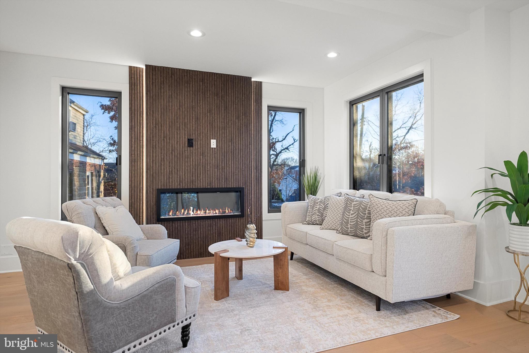 2100 South Nelson Street Arlington, VA 22204 - Photo 9 of 33 a living room with furniture and a fireplace