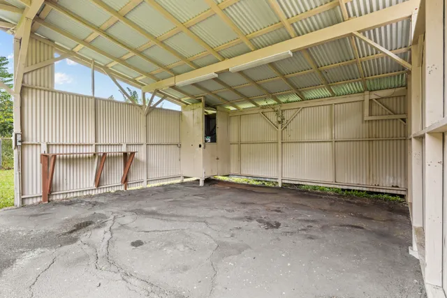a view of a city with lush green forest