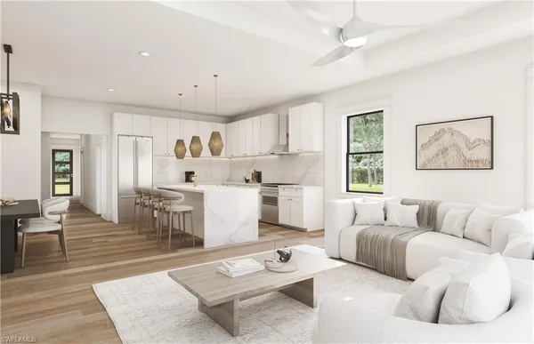 a living room with furniture and a window