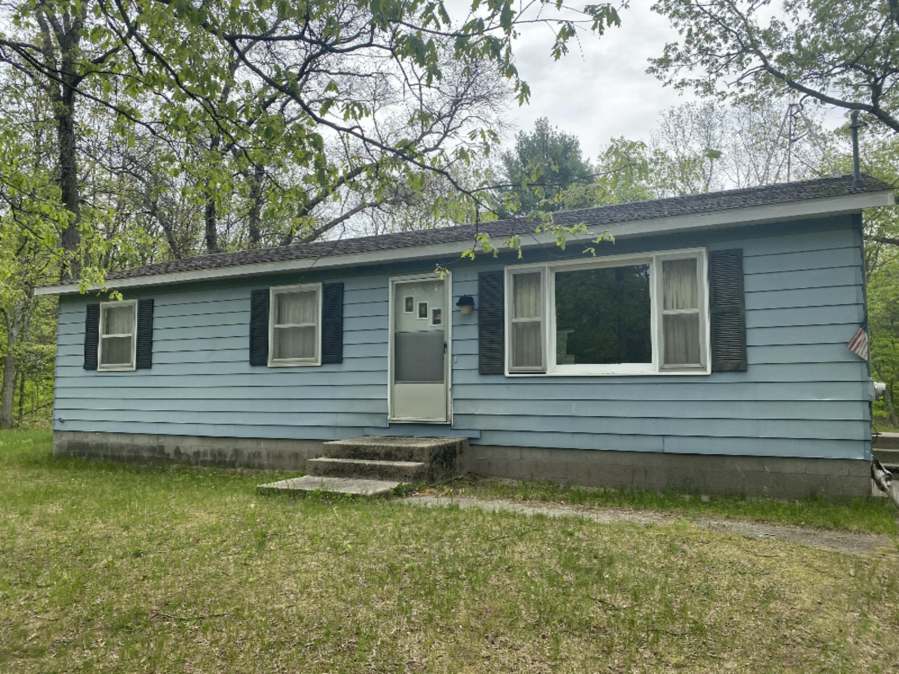 10070 Schow Road Holton, MI 49425 - Photo 1 of 10 IMG-4048