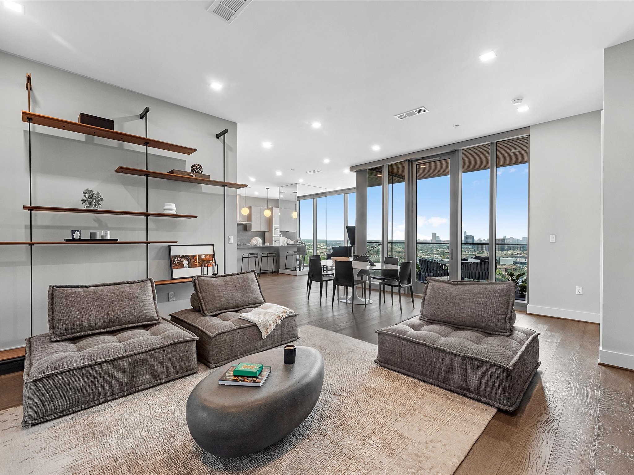 1711 Allen Parkway, Unit 2102 Houston, TX 77019 - Photo 4 of 17 a living room with furniture and a large window