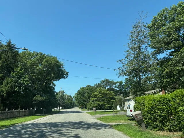 a view of a house with a big yard