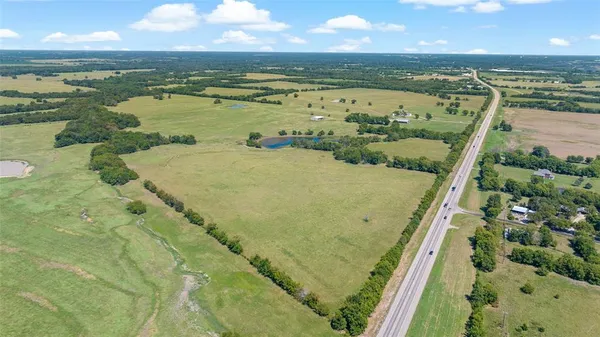 a view of a lake from a balcony