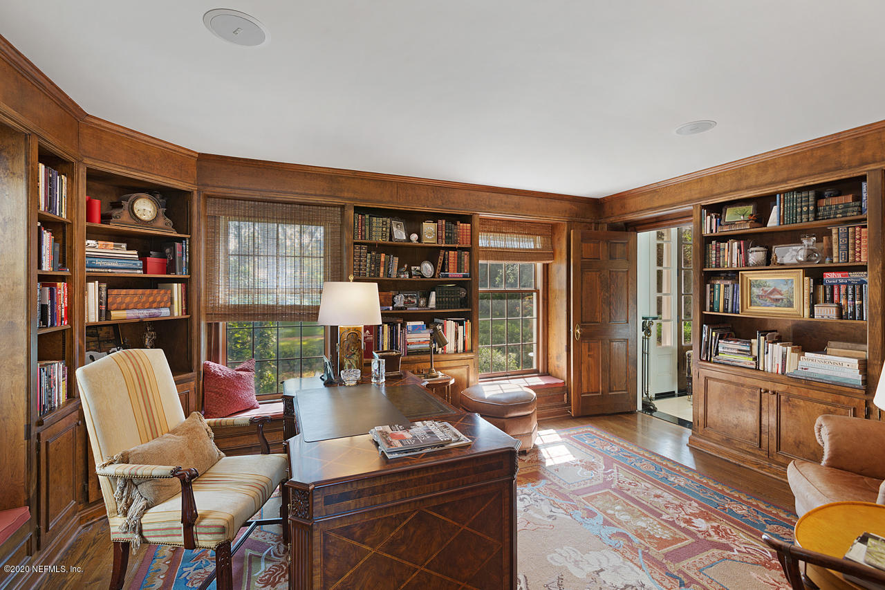 5015 River Point Road Jacksonville, FL 32207 - Photo 31 of 49 a dining room with furniture and wooden floor