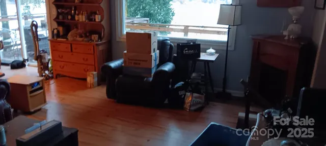 a bedroom with bed and a window