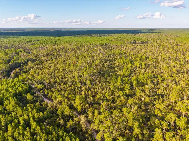 a view of a room with an outdoor space and seating