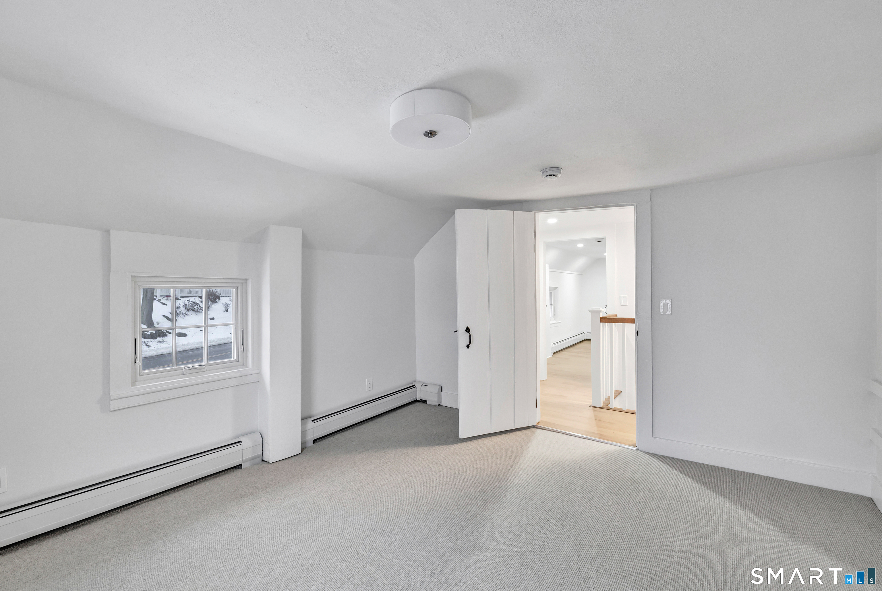 315 Main Street Westport, CT 06880 - Photo 11 of 19 a view of a livingroom with an empty space and workspace