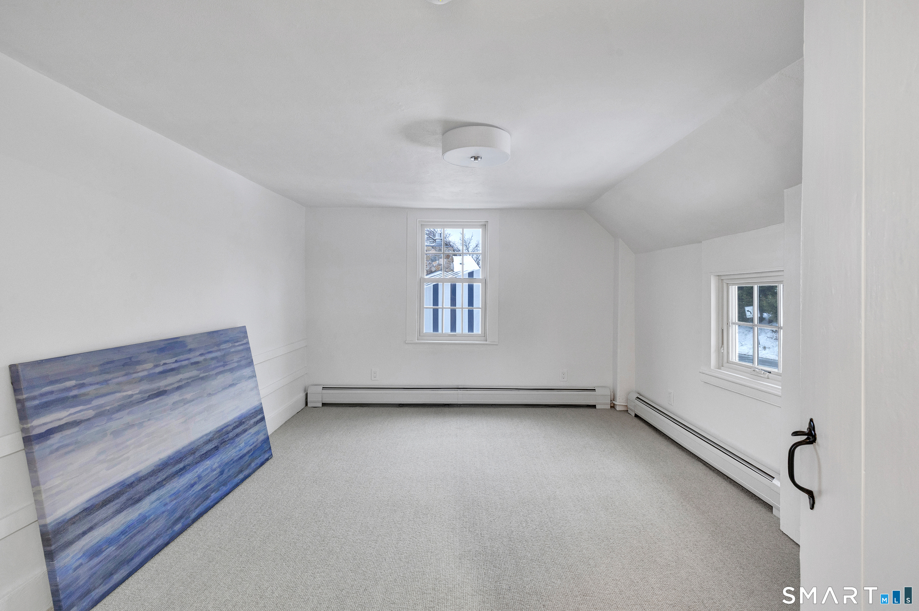 315 Main Street Westport, CT 06880 - Photo 10 of 19 a view of an empty room with a window