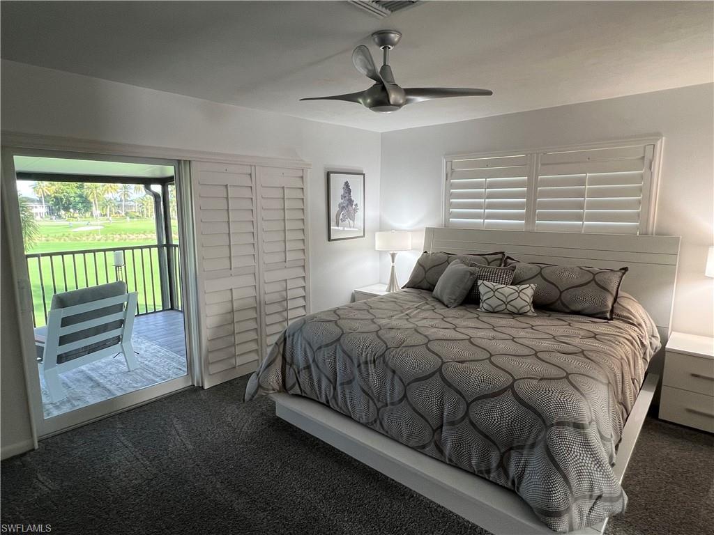 348 Tern Drive, Unit 2 Naples, FL 34112 - Photo 11 of 28 a bedroom with a bed and a window