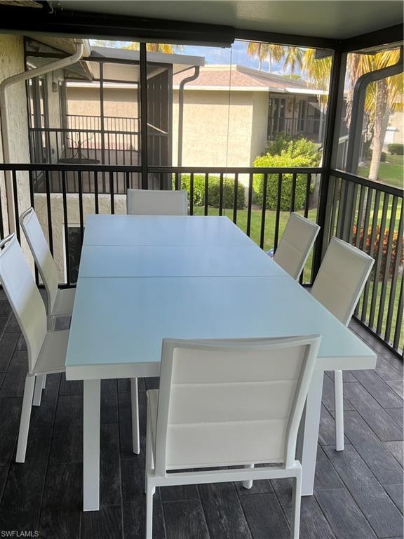 348 Tern Drive, Unit 2 Naples, FL 34112 - Photo 16 of 28 a balcony view with a seating space