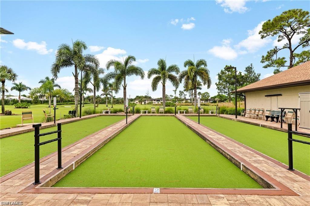 348 Tern Drive, Unit 2 Naples, FL 34112 - Photo 20 of 28 a view of swimming pool with outdoor seating