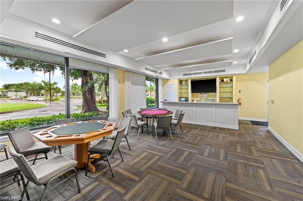 348 Tern Drive, Unit 2 Naples, FL 34112 - Photo 21 of 28 a outdoor space with furniture
