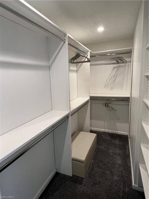 348 Tern Drive, Unit 2 Naples, FL 34112 - Photo 10 of 28 a bathroom with a toilet and a shower