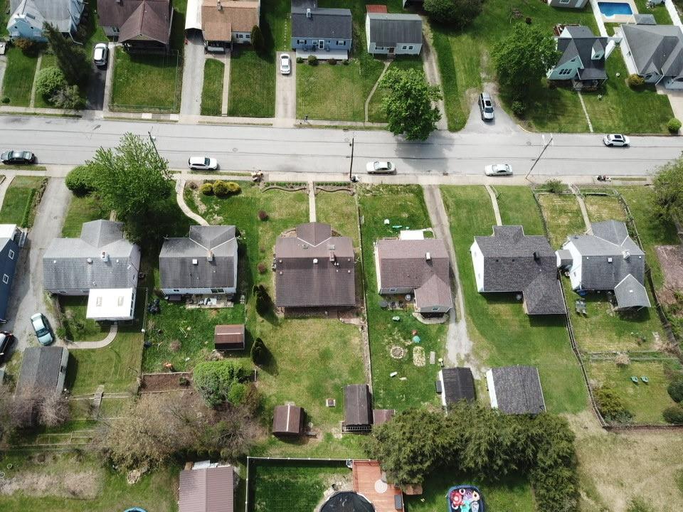203 Carson Street Springdale, PA 15144 - Photo 38 of 43 an aerial view of a house with a garden and swimming pool