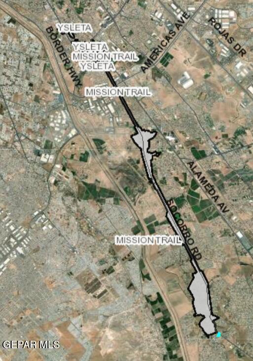 12940 Cuadrilla Road San Elizario, TX 79849 - Photo 21 of 22 a view of a dry yard with lots of trees