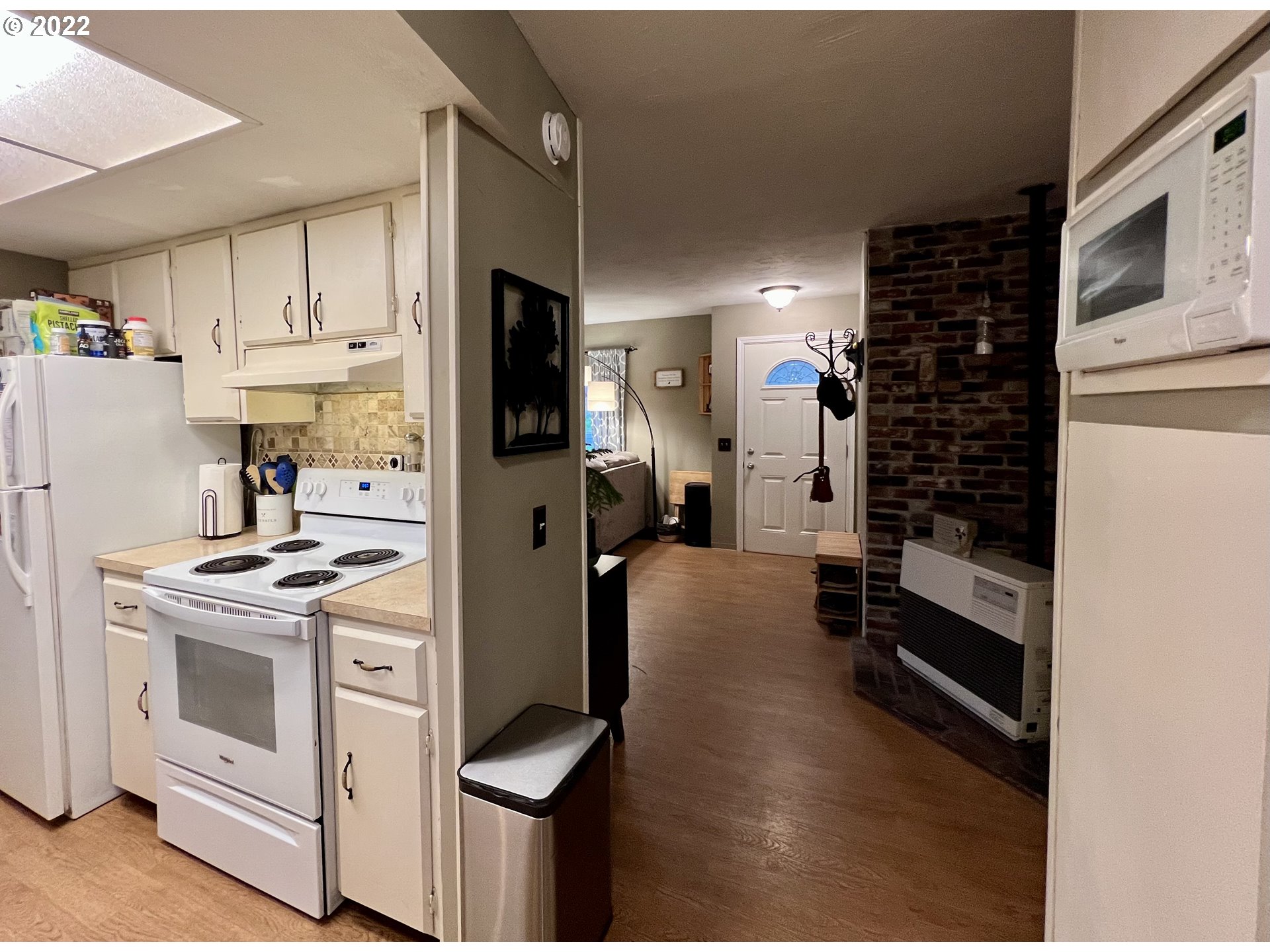 620 Highway 11 Pendleton, OR 97801 - Photo 11 of 26 a kitchen with stainless steel appliances a stove a refrigerator and cabinets