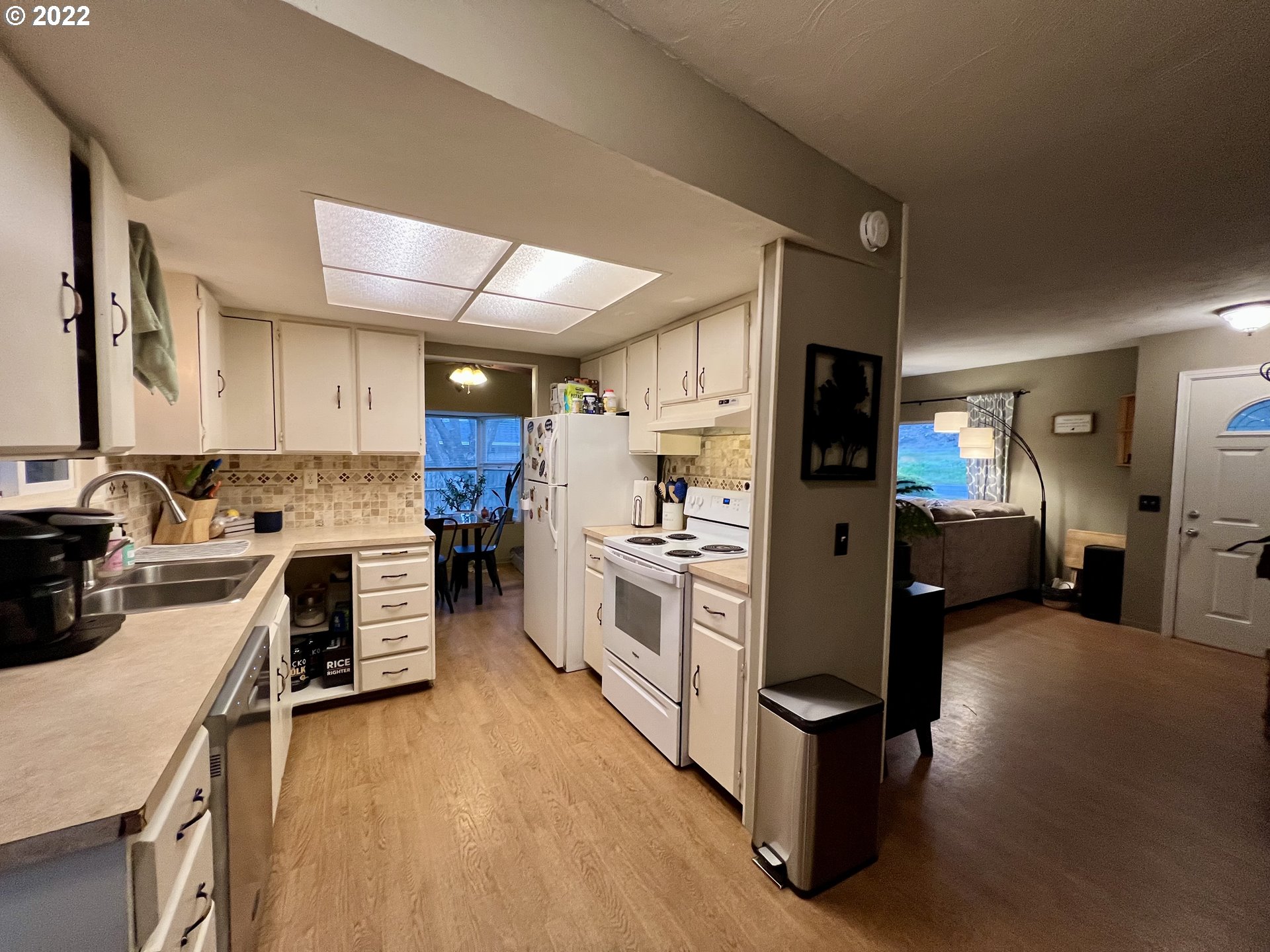 620 Highway 11 Pendleton, OR 97801 - Photo 12 of 26 a kitchen with stainless steel appliances a stove refrigerator sink and cabinets