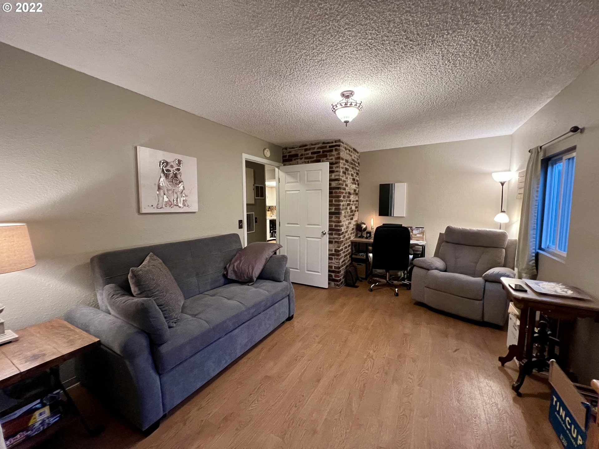 620 Highway 11 Pendleton, OR 97801 - Photo 14 of 26 a living room with furniture and a wooden floor