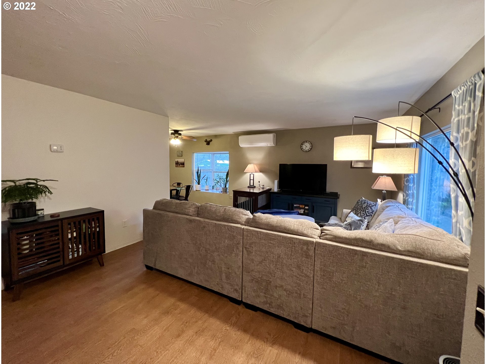 620 Highway 11 Pendleton, OR 97801 - Photo 7 of 26 a living room with furniture and a flat screen tv