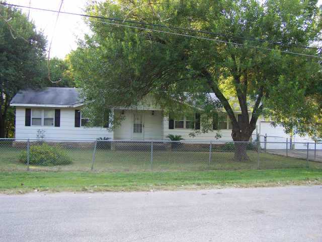 3318 River Road Cedar Creek, TX 78612 - Photo 1 of 1 front view of a house with a yard