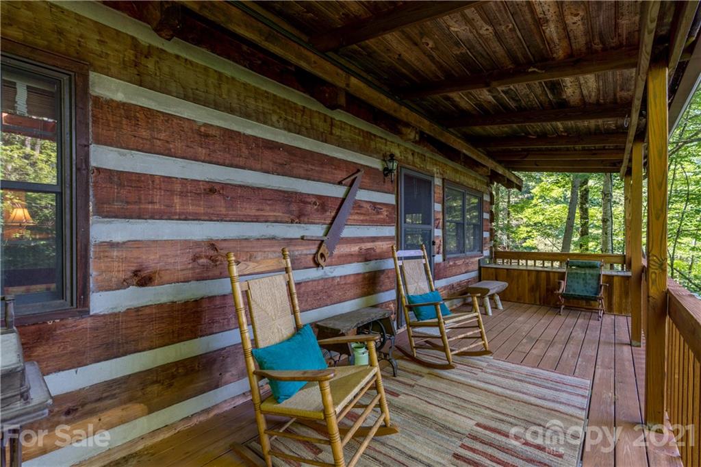 602 Quail Cove Road Clyde, NC 28721 - Photo 38 of 48 a view of furniture in wooden floor