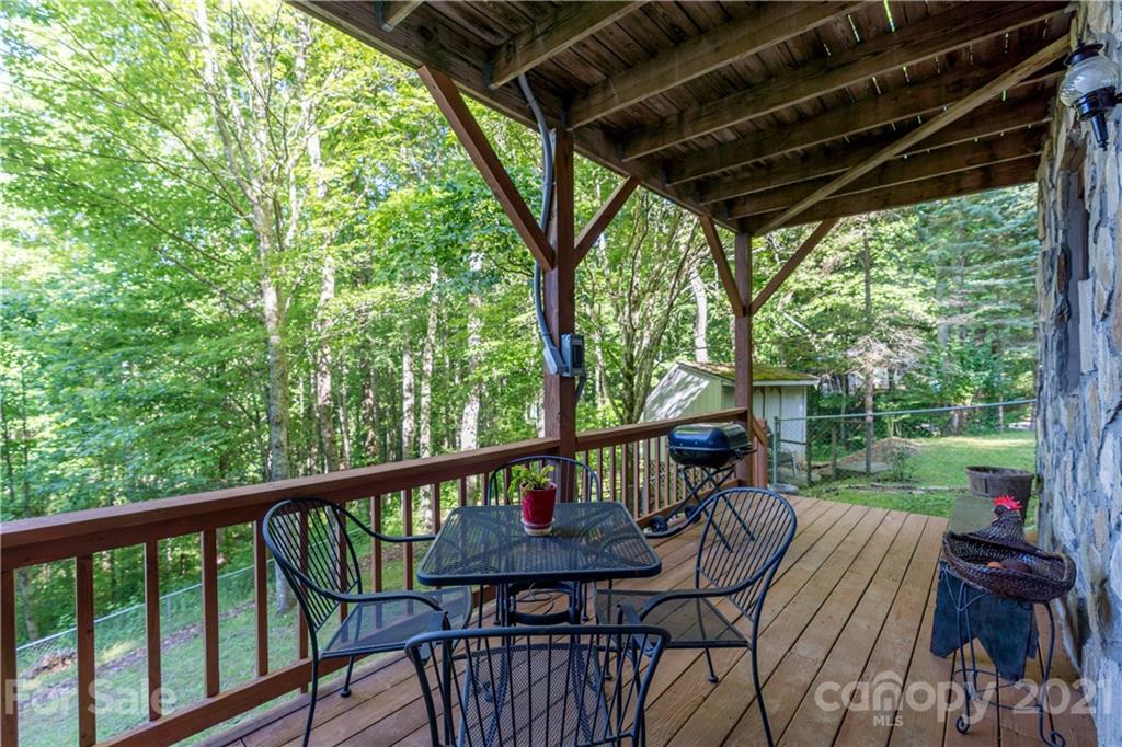 602 Quail Cove Road Clyde, NC 28721 - Photo 41 of 48 a view of a patio on the deck