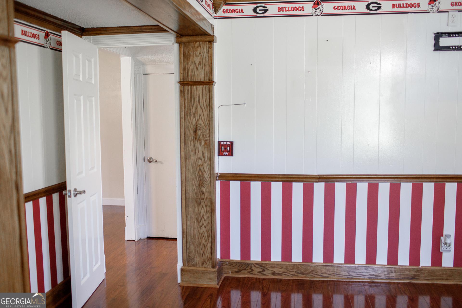2110 Ware Street Blackshear, GA 31516 - Photo 29 of 57 a view of a hallway with wooden floor and entryway