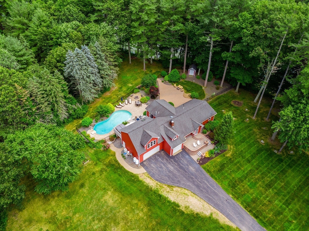 an aerial view of residential house with outdoor space