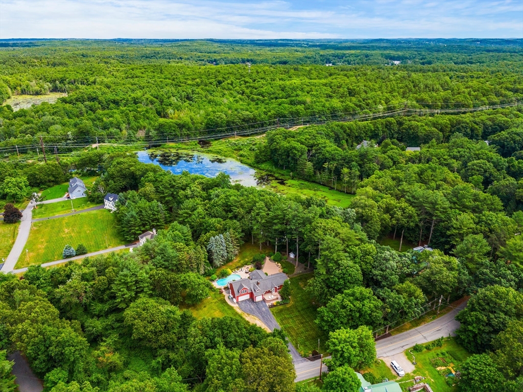 152 Gay Road Groton, MA 01450 - Photo 38 of 38 an aerial view of residential houses with outdoor space and trees