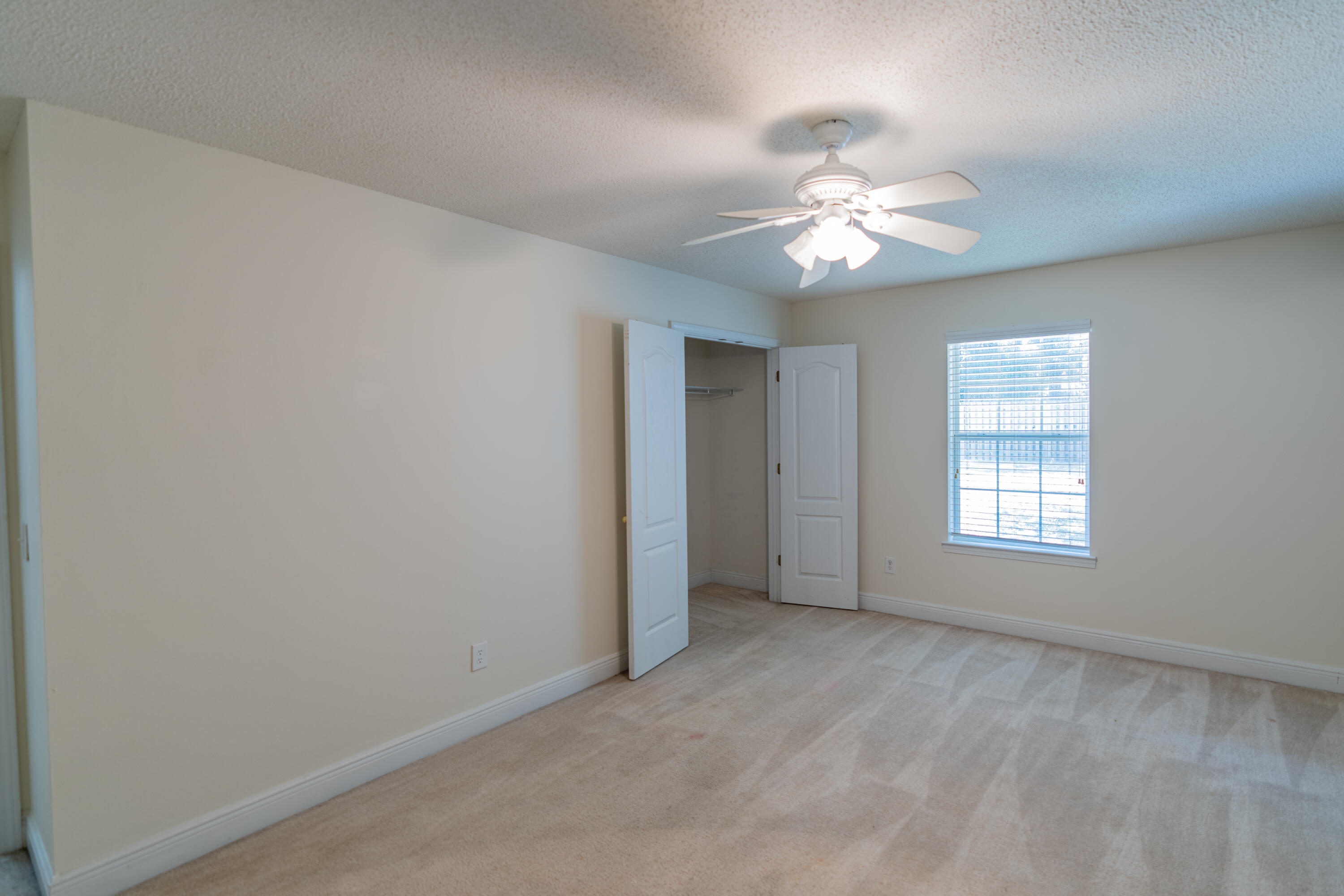 231 Foxchase Way Crestview, FL 32536 - Photo 15 of 30 a view of an empty room with a window