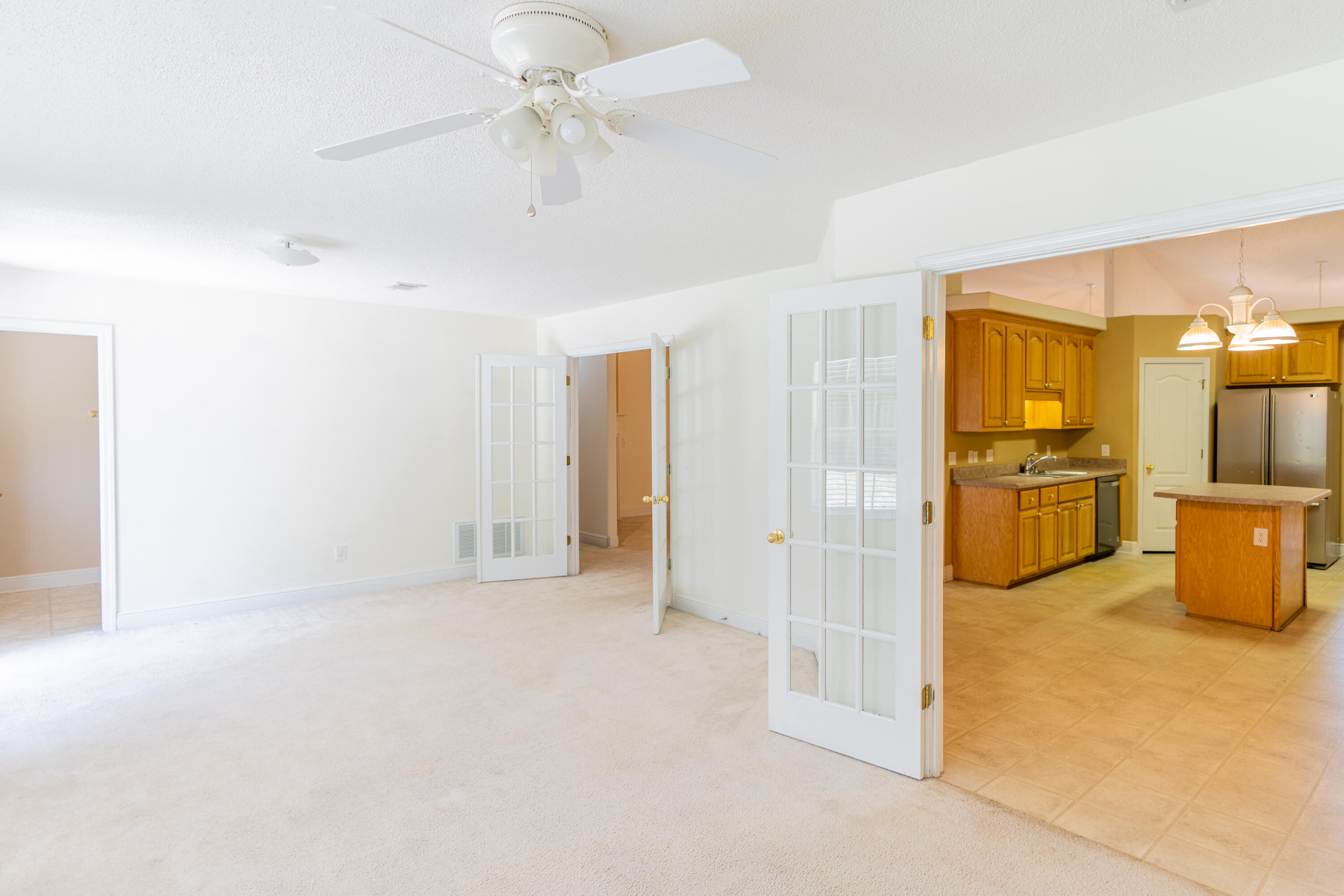 231 Foxchase Way Crestview, FL 32536 - Photo 17 of 30 a view of a kitchen with a sink and a refrigerator