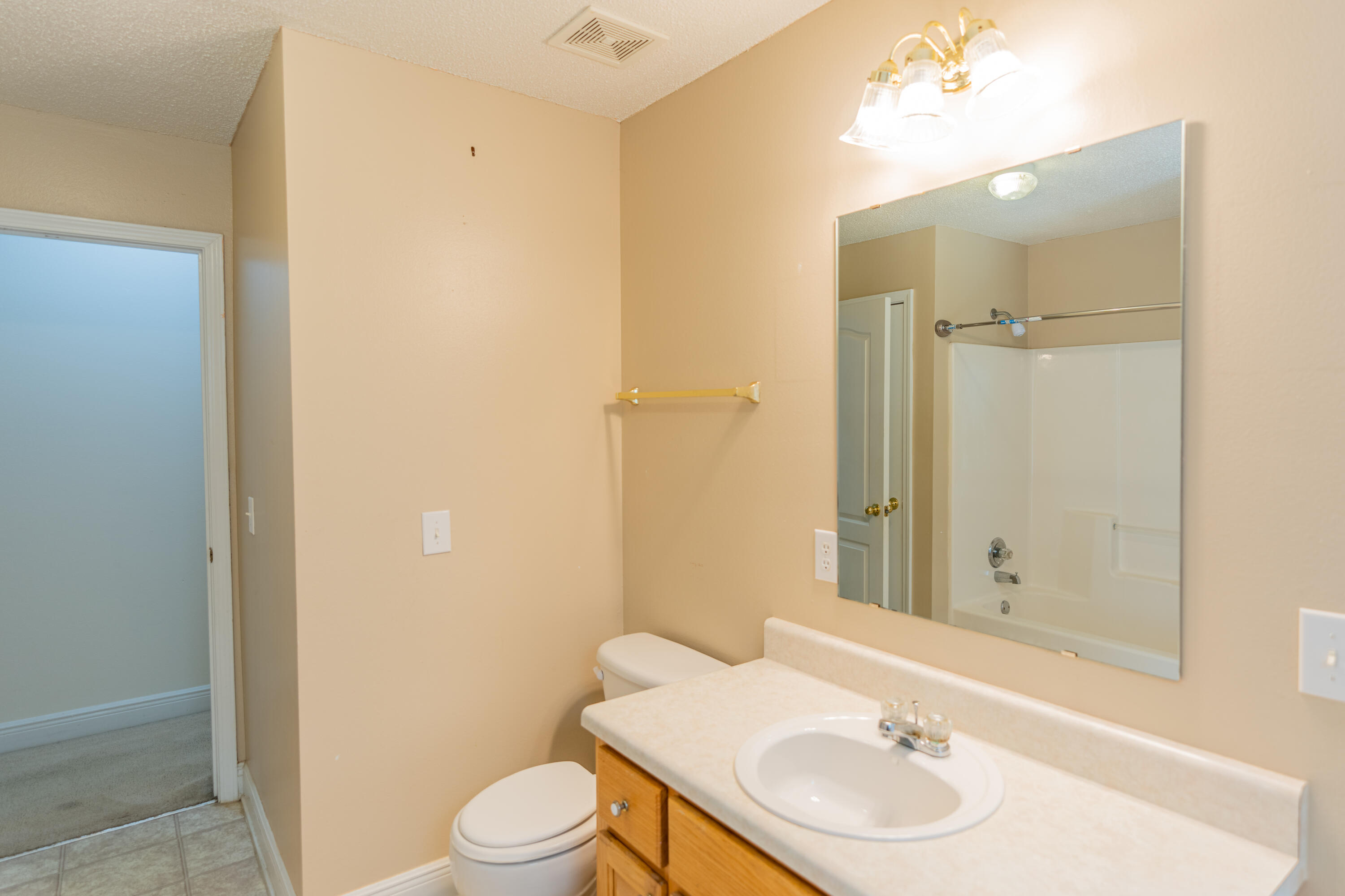 231 Foxchase Way Crestview, FL 32536 - Photo 18 of 30 a bathroom with a sink toilet and shower