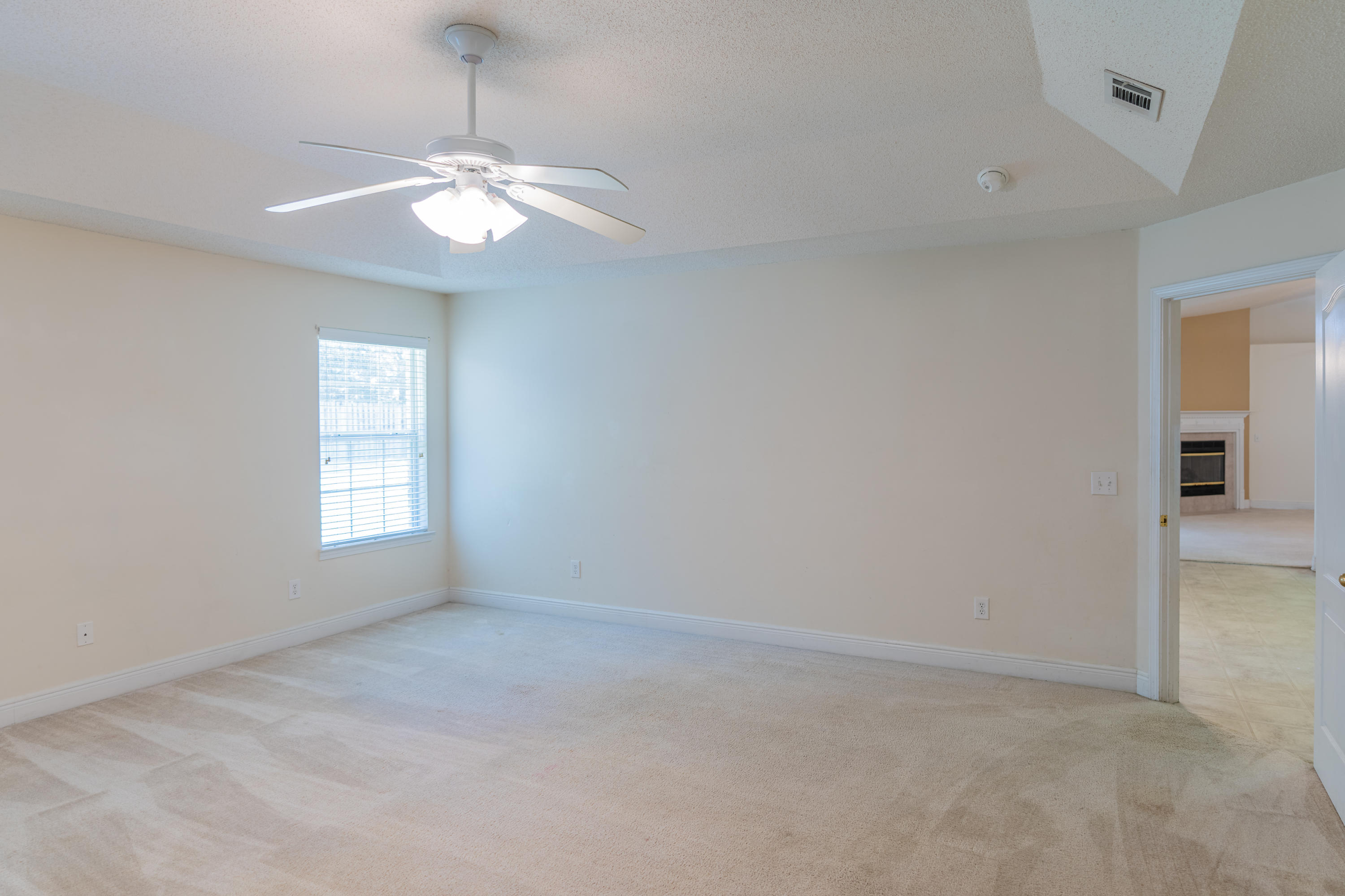 231 Foxchase Way Crestview, FL 32536 - Photo 22 of 30 a view of an empty room with a window