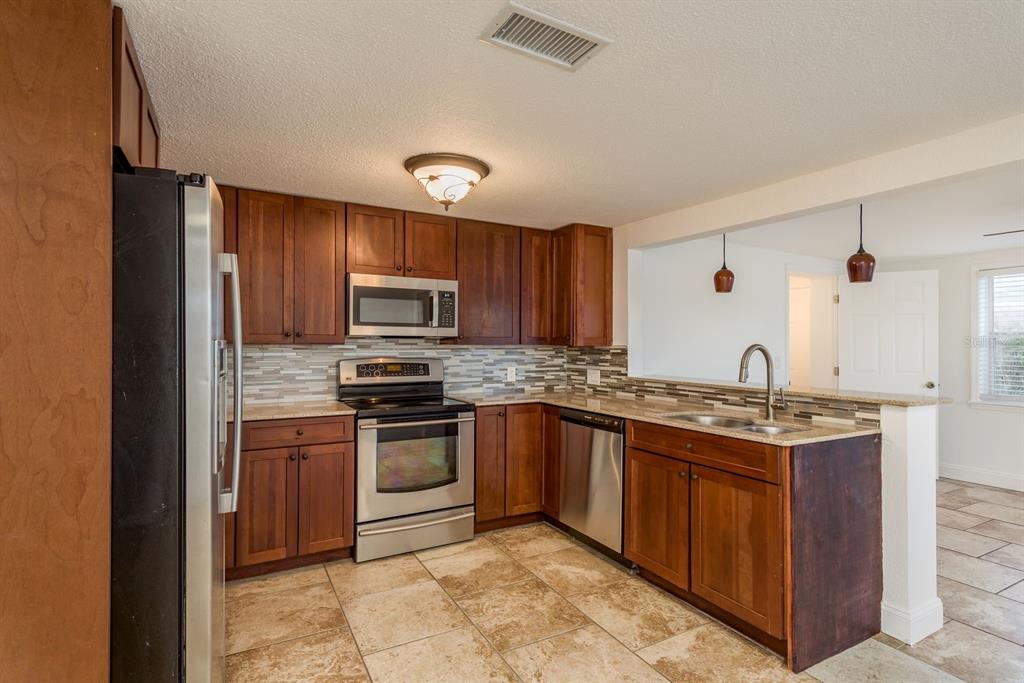 4233 Belle Isle Court New Port Richey, FL 34653 - Photo 9 of 28