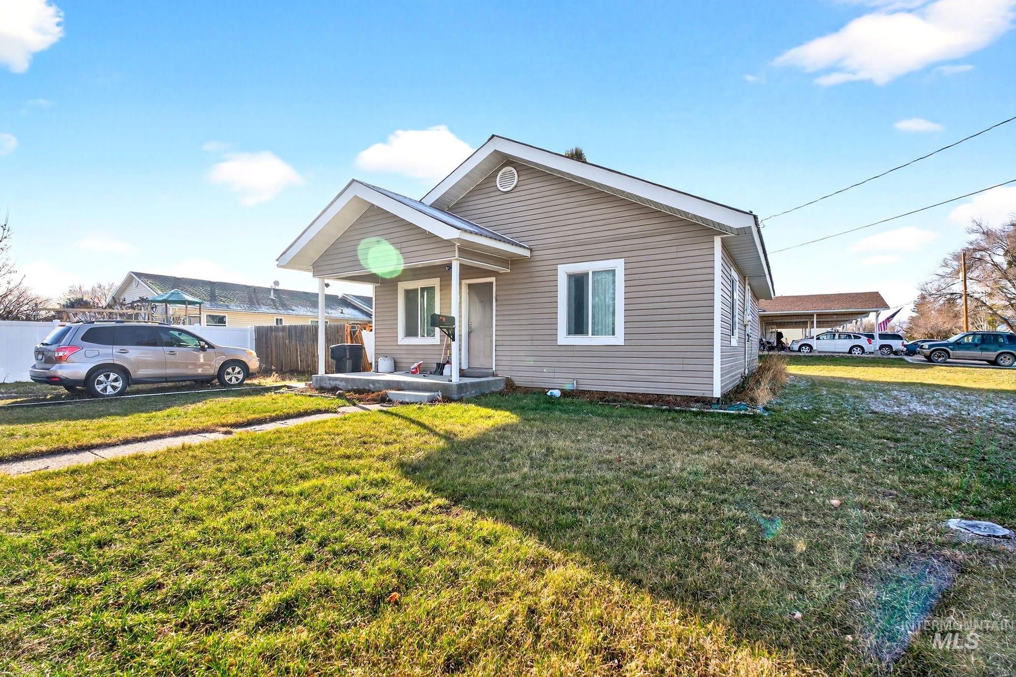 Bungalow-style home with covered porch